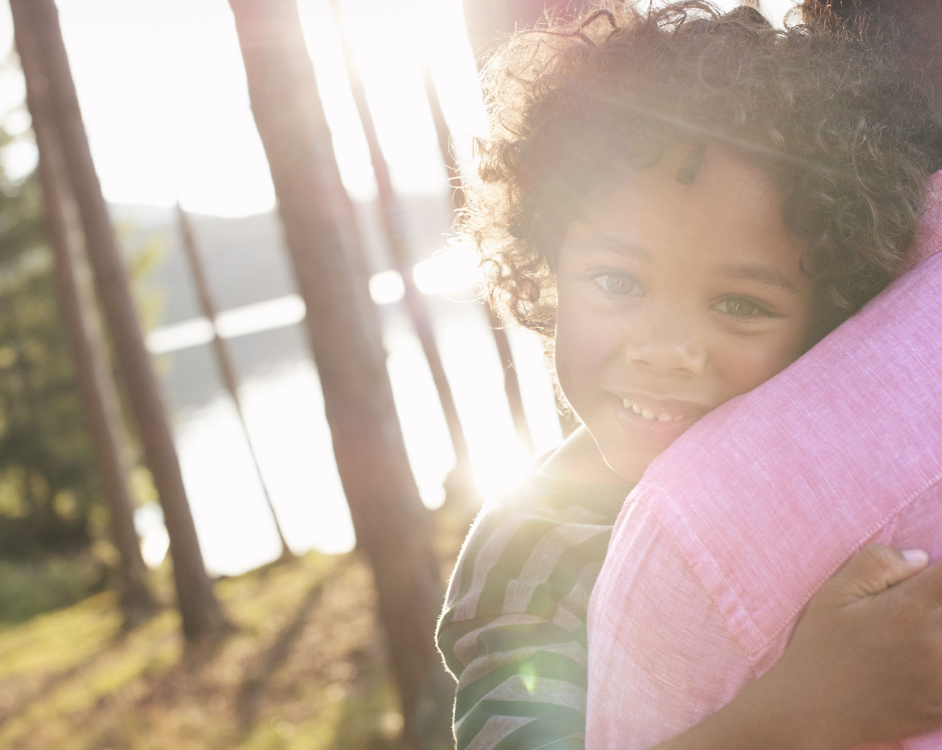 Child hugging parent